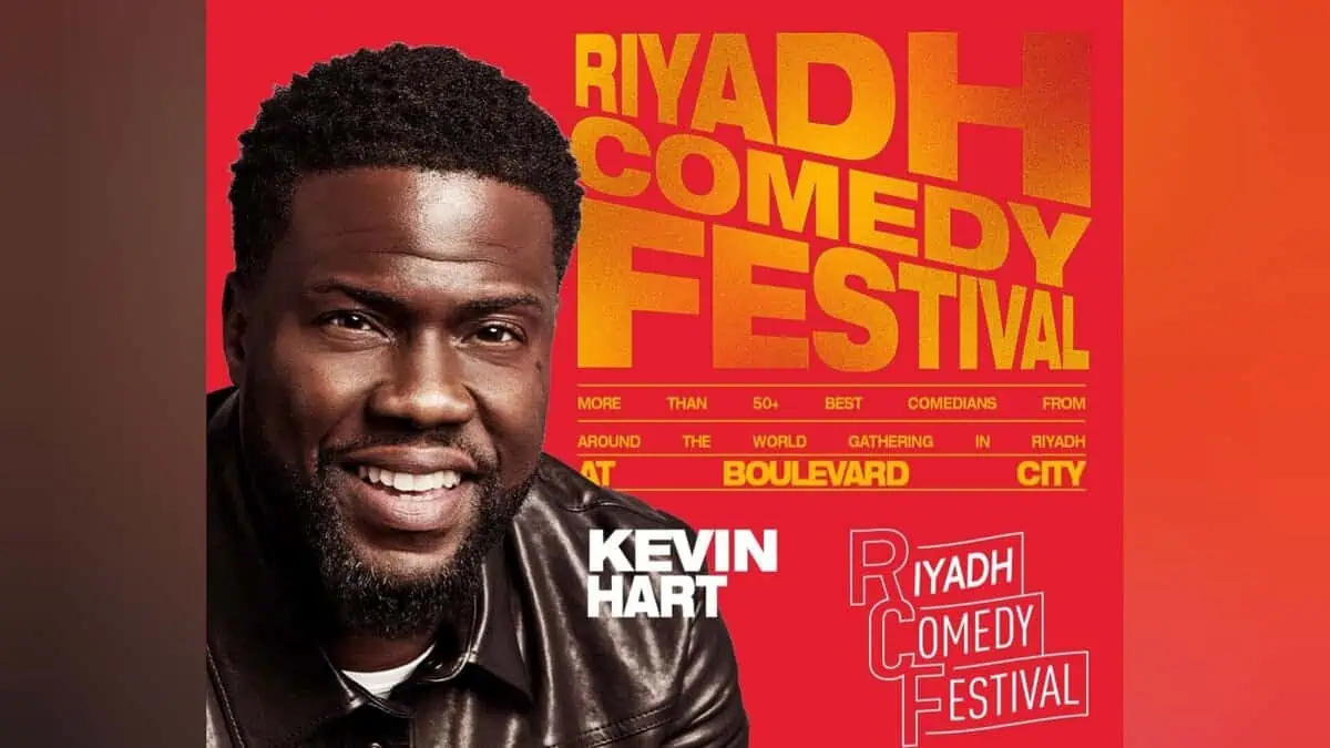 Kevin Hart smiles in a promotional poster for the Riyadh Comedy Festival 2025, set against a red and orange background with event details.