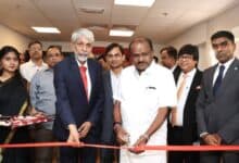 Union Minister H D Kumaraswamy cuts the ribbon at the inauguration of SAIL's Dubai office, joined by SAIL CMD Amarendu Prakash, Consul General Satish Kumar Sivan, and senior officials.