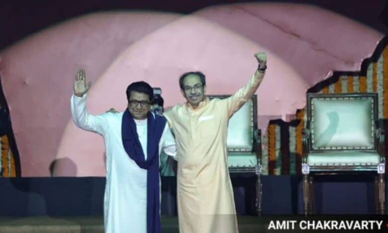 Shiv Sena (UBT) chief Uddhav Thackeray with his cousin and MNS president Raj Thackeray at the NSCI Dome in Worli on Saturday. (Express Photo: Amit Chakravarty)