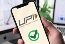 The image of a smartphone screen showing a UPI app with a green checkmark confirming a successful digital payment.