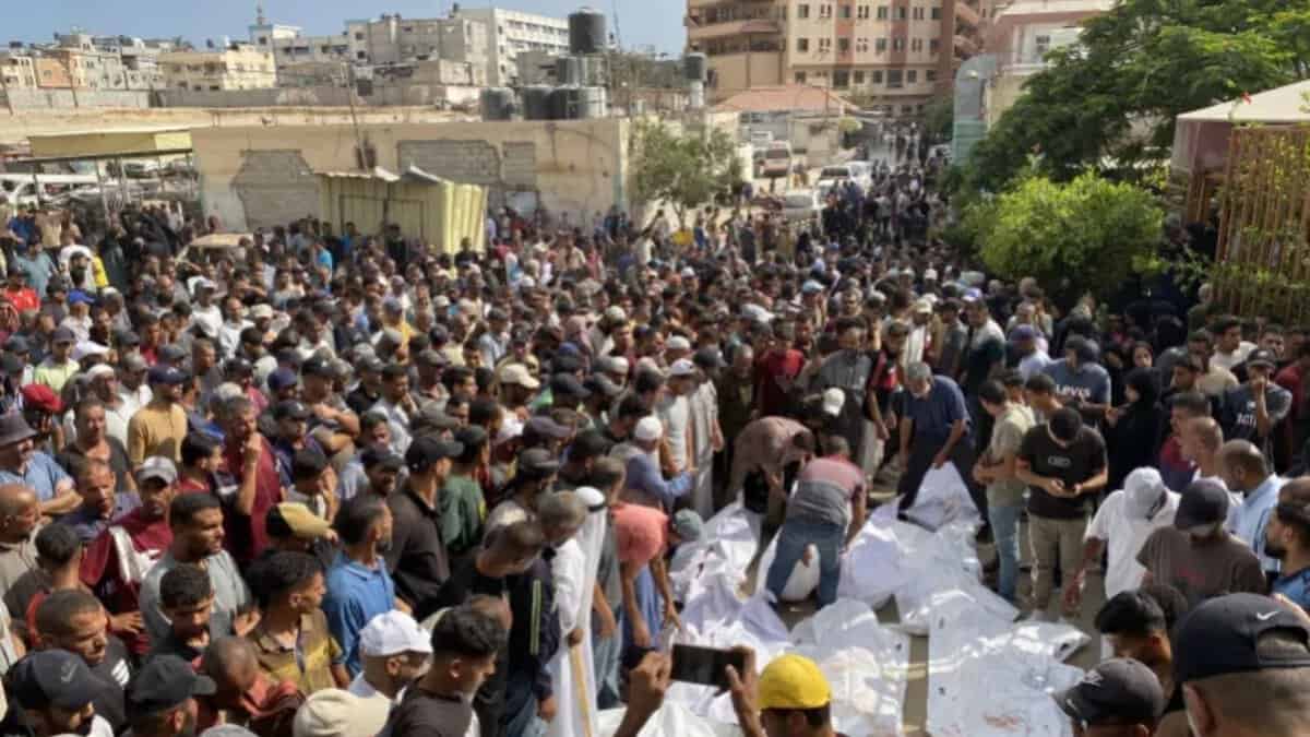 Relatives of Palestinians, who were killed in an Israeli attack on Khan Younis, attend a funeral ceremony in front of Nasser Hospital in Gaza City on Friday [Abdallah Fs Alattar/Anadolu]