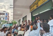 Farmers at a fertilizer shop in Telangana