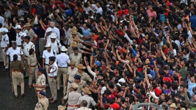 Massive crowd waits for a glimpse of winning team Royal Challengers Bengaluru team during the felicitation ceremony in Bengaluru