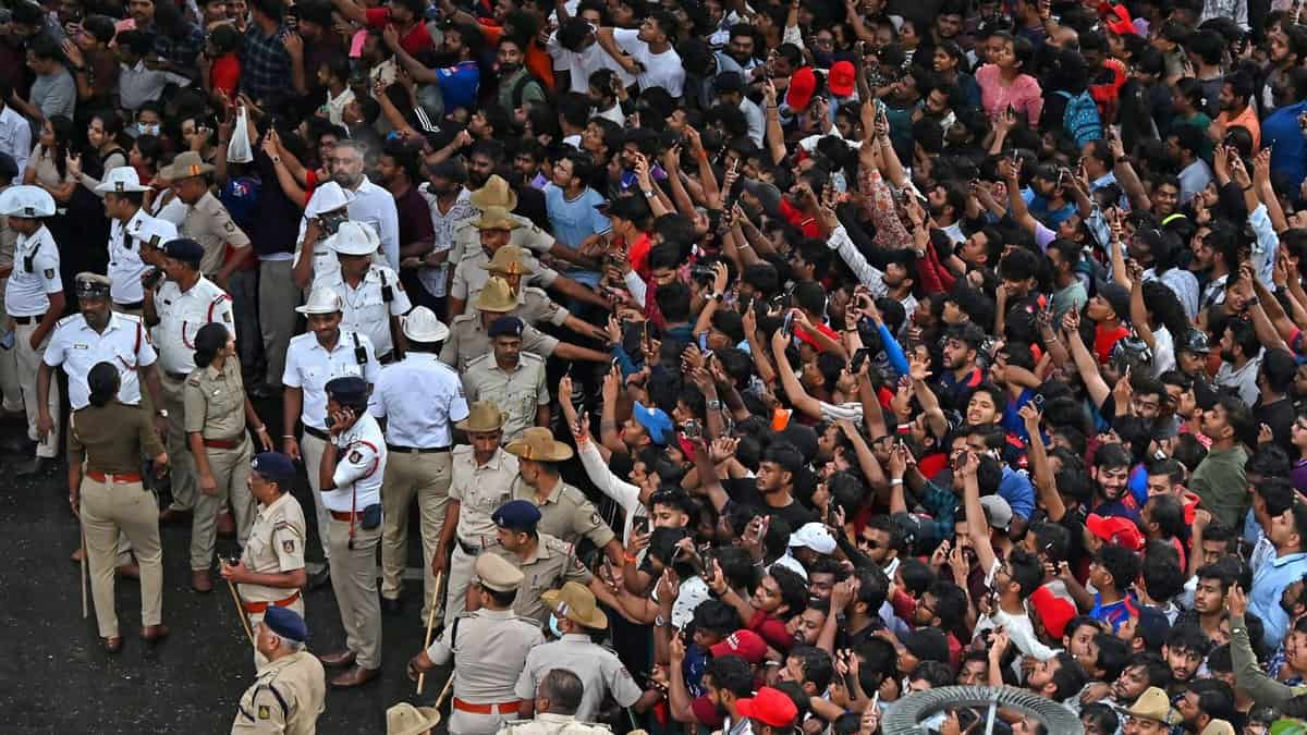 Massive crowd waits for a glimpse of winning team Royal Challengers Bengaluru team during the felicitation ceremony in Bengaluru