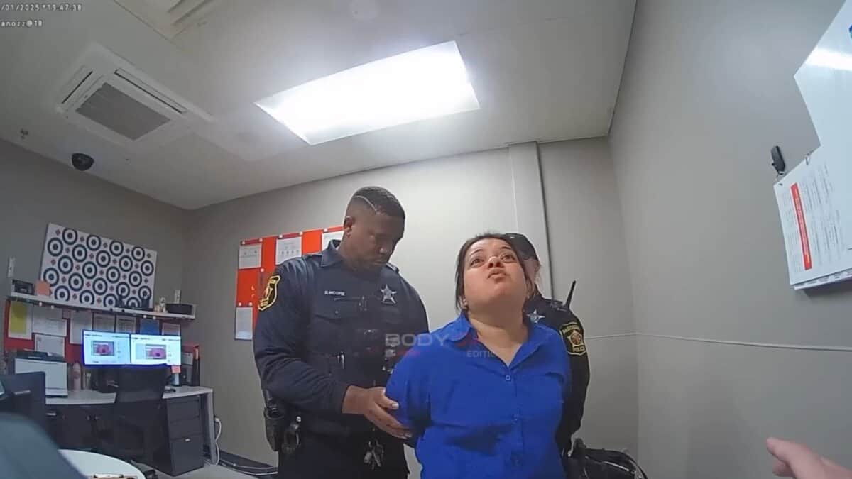 Indian woman who is accused of shoplifting USD 1,300 at Target, being detained by the US police