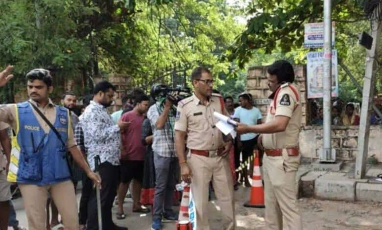 Police inspect the crime scene at Malakpet