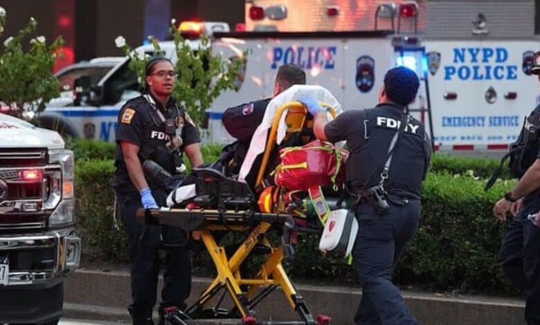 Police officers shift victims to a hospital