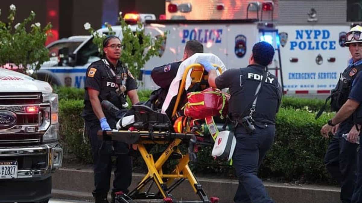 Police officers shift victims to a hospital