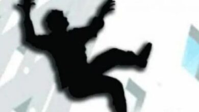 A representational image of a person falling from a building