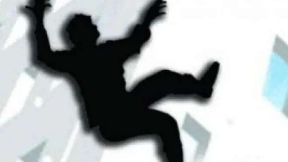 A representational image of a person falling from a building