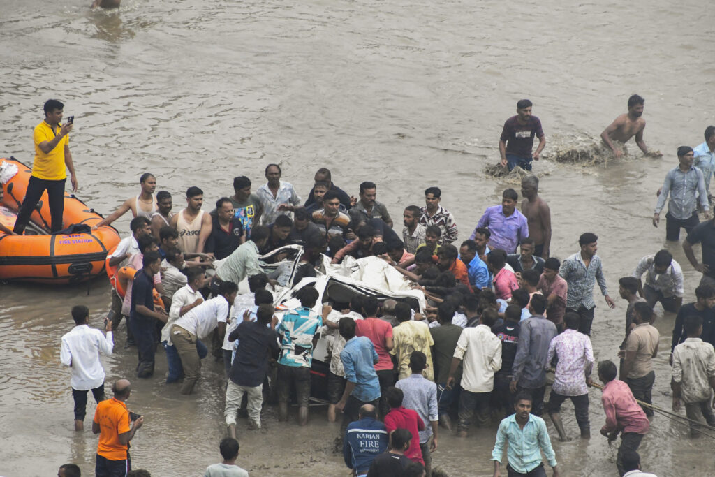 Vehicles plunge into river after bridge collapse in Vadodara