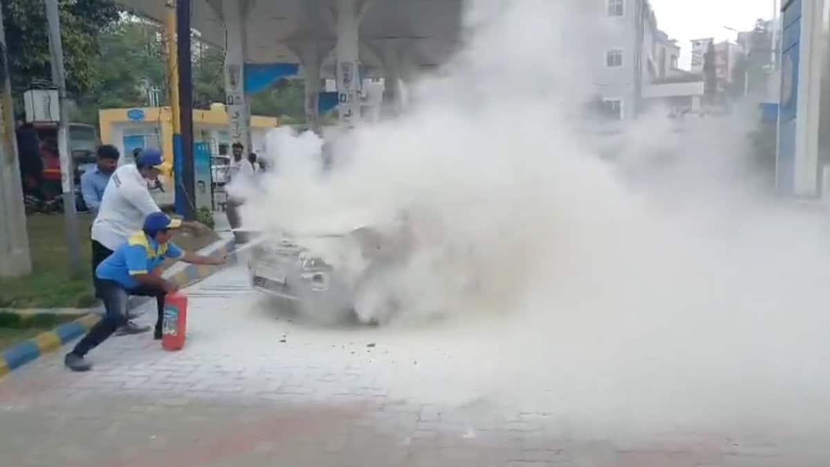 car catches fire in front of petrol pump in Mailardevpally