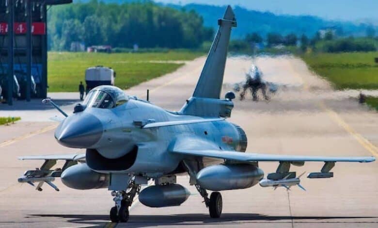 Chinese J-10C fighter jet on runway with another jet in background.