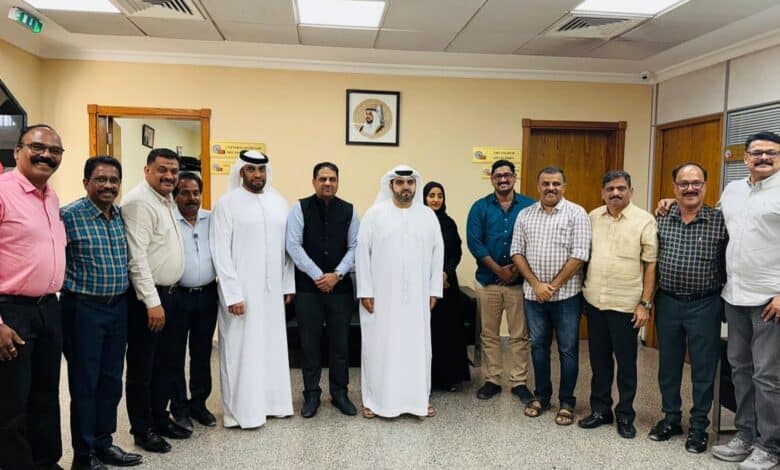 Group photo of Indian Association Sharjah members and Sharjah Police officials at a meeting to launch the Family Dispute Redressal Committee.