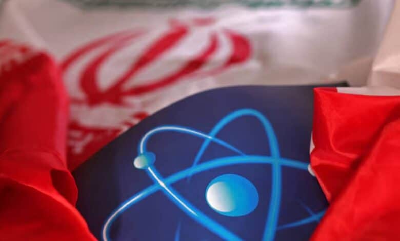 Illustration showing Iran's flag alongside an atomic symbol, representing the country’s nuclear programme.