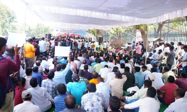 The image shows outsourced employees holding a protest at the Dharna Chowk near Indira Park on Saturday, July 12, 2025.