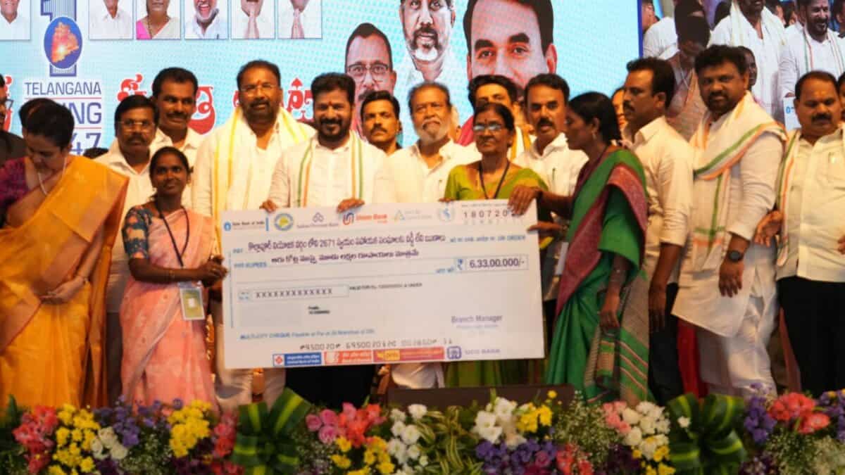 Revanth Reddy hands out interest free loan cheques to SGHs