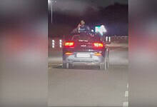 Video: Man filmed drinking, smoking from car sunroof on Hyderabad airport road