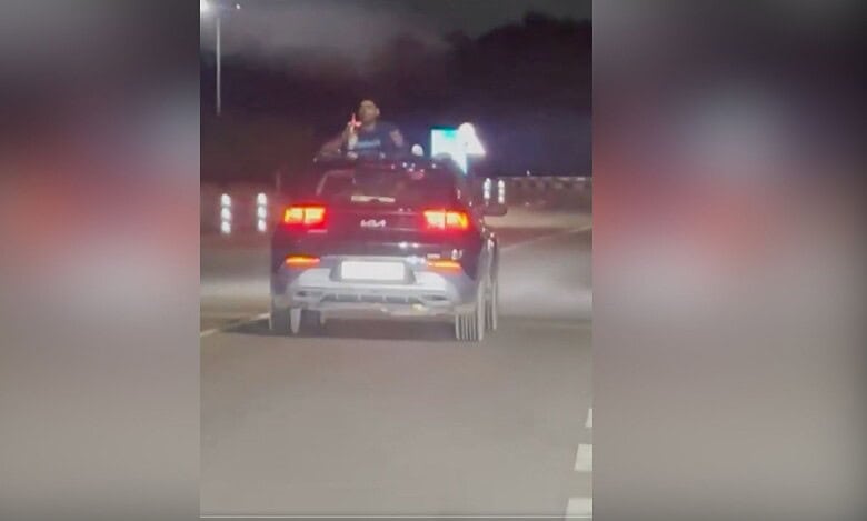 Video: Man filmed drinking, smoking from car sunroof on Hyderabad airport road