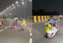 Boys perform bike stunts of Aramghar flyover