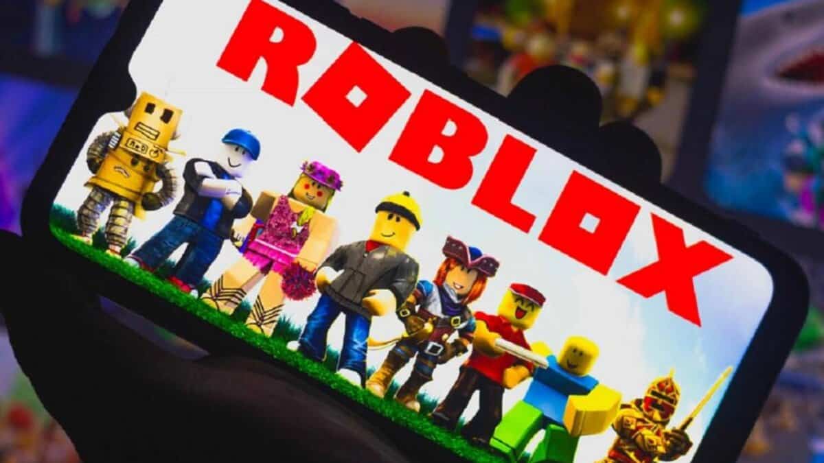 A group of Roblox characters standing on grass, displayed on a phone screen with the