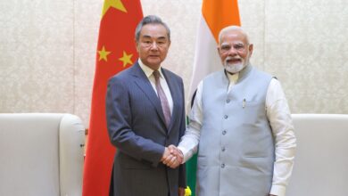 Prime Minister Narendra Modi with Chinese Foreign Minister Wang Yi during a meeting in New Delhi