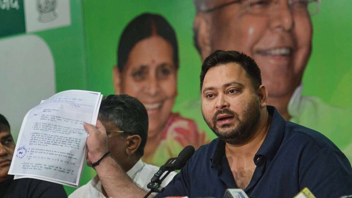Leader of Opposition in the Bihar Assembly and RJD leader Tejashwi Yadav addresses a press conference in Patna on Saturday. (PTI Photo)
