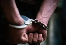 An image of a handcuffed person used for representational purposes