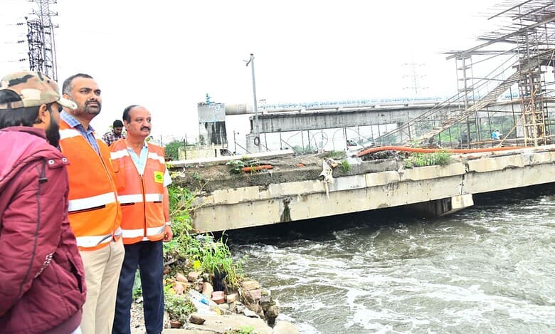 GHMC Commissioner RV Karnan reviews the ongoing construction of Moosarambagh bridge in the city on Wednesday