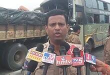 A police official briefs the media about the accident