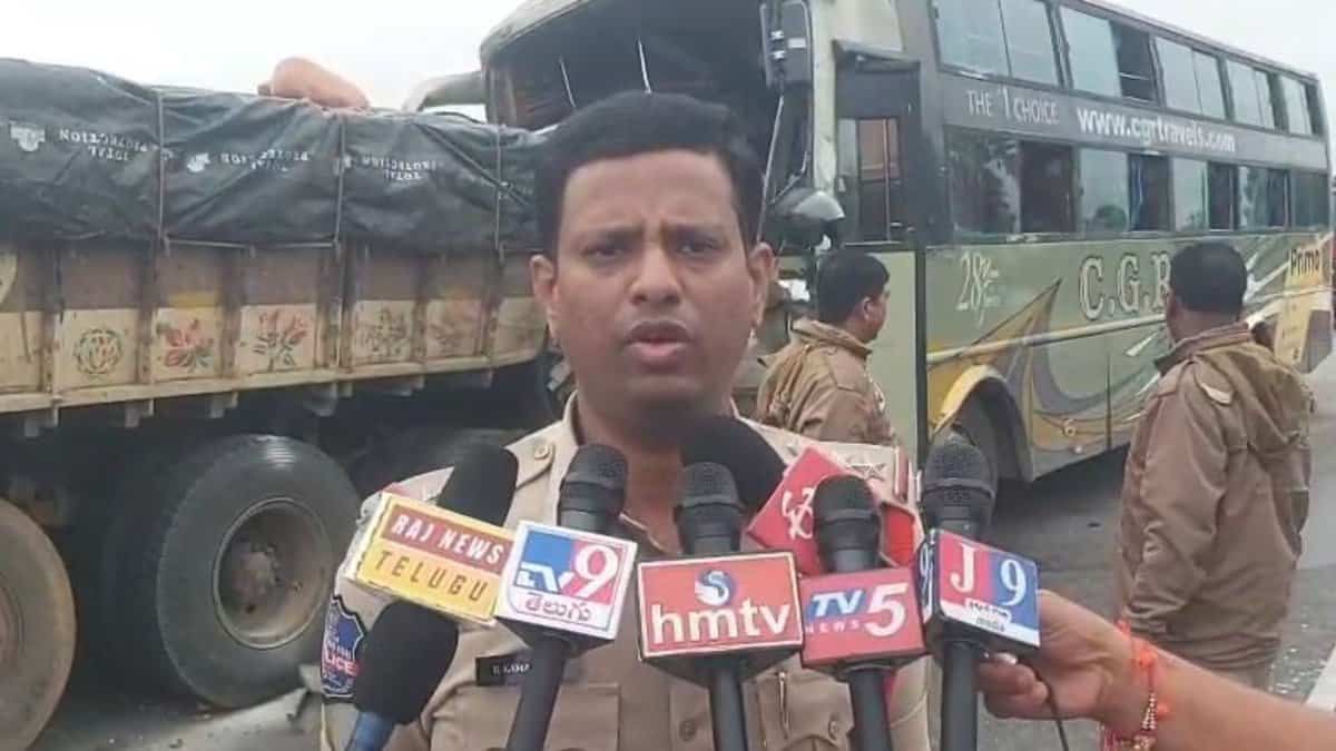 A police official briefs the media about the accident