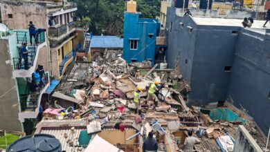 Rescue operation underway following a cylinder blast in Bengaluru on Friday.(PTI Photo)