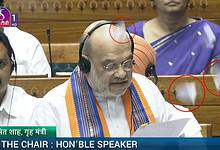 Opposition throws torn copies of the three contentious Bills on Union Home Minister Amit Shah in Lok Sabha on Wednesday