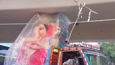 A Ganesha idol stuck under the Punjagutta Flyover, causing massive traffic