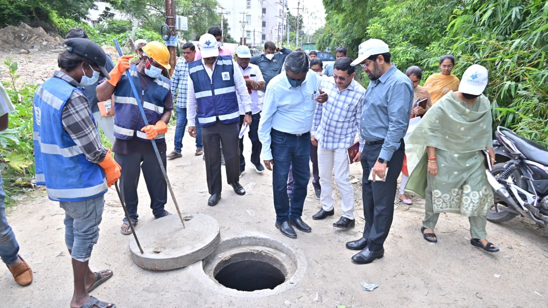 HMWSSB MD Ashok Reddy inspects a manhole in Kavuri Hills on Monday