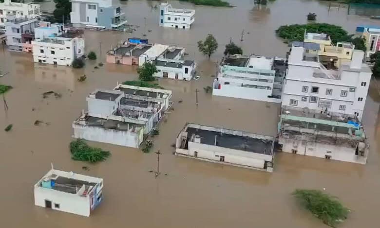 Image of partially submerged houses in Telangana's Kamareddy district
