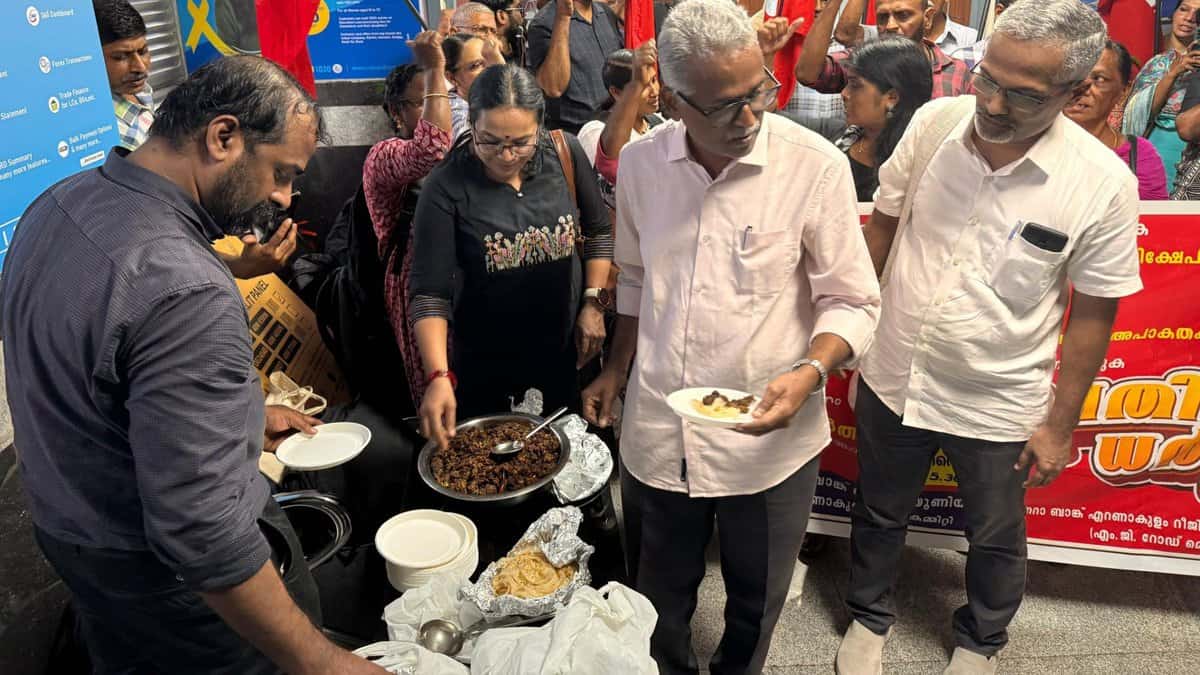 Staff staged a ‘beef festival’ outside the office of a Canara Bank branch in Kochi