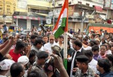 Asaduddin Owaisi unfurls the national flag at Madina Circle in Hyderabad