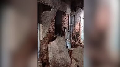 Heavy rains in Hyderabad result in a portion of a building to collapse in Hussaini Alam
