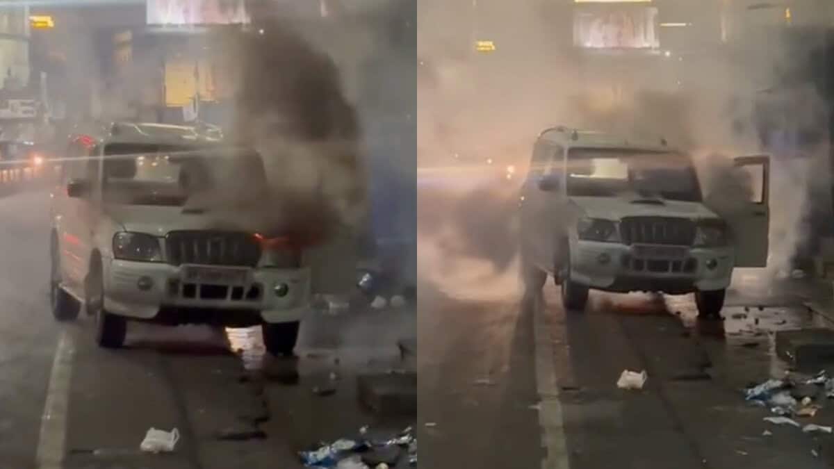 A jeep on fire near Madina building in Hyderabad on Wednesday