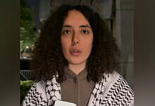Haya Adam, a second-year law and international relations student, wearing a keffiyeh during an interview.