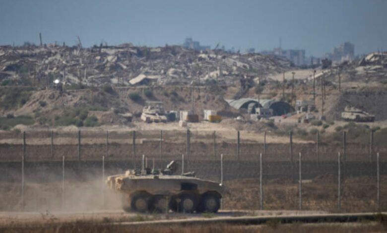 Israeli armoured vehicle patrols near Gaza border in southern Israel.