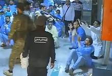 men in military garb killing medical worker