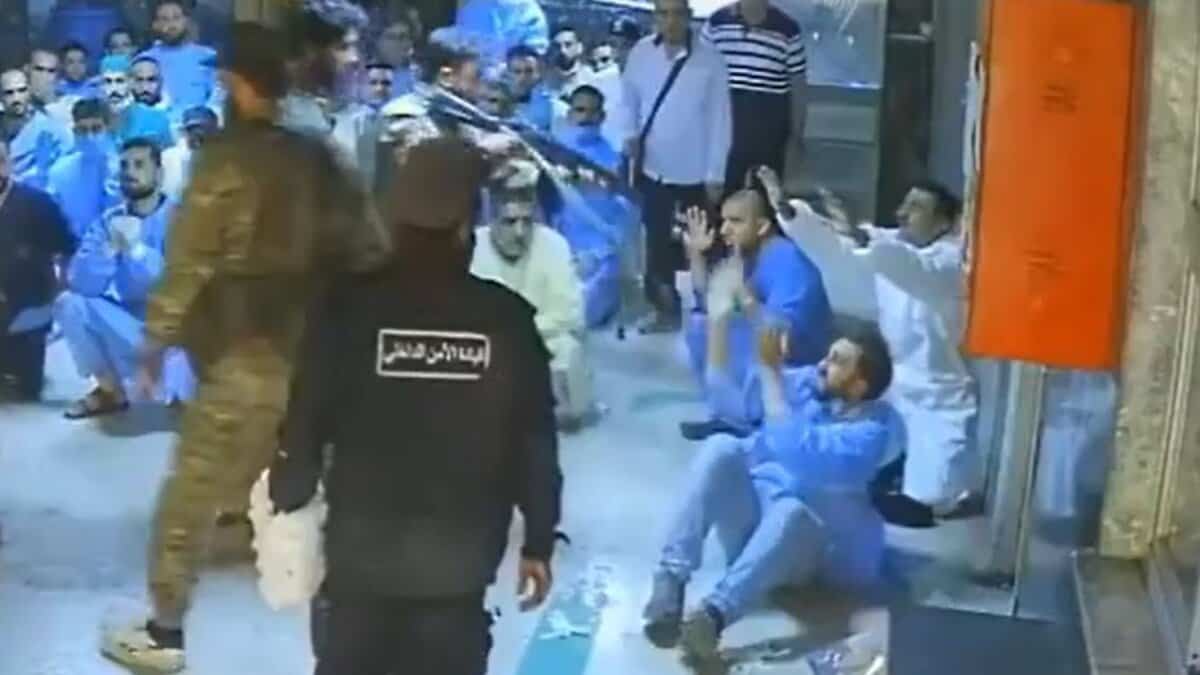 men in military garb killing medical worker