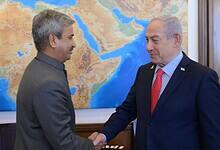 Israeli Prime Minister Benjamin Netanyahu shakes hands with India’s Ambassador to Israel, J P Singh, during a meeting in Jerusalem.