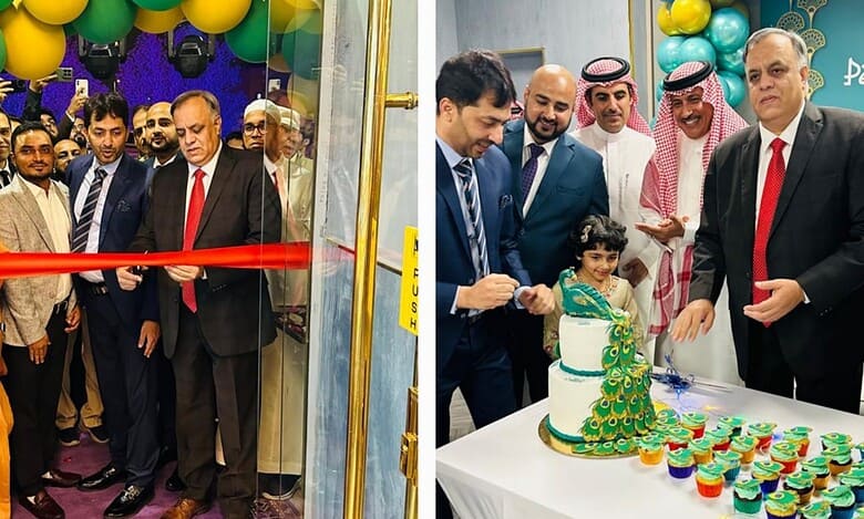 Dr Suhel Khan cuts ribbon and cake at Peacock Restaurant’s Riyadh opening with Indian and Saudi guests.