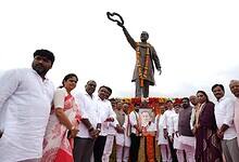 Revanth Reddy offering tribute at Rajiv Gandhi's statue at the State Secretariat
