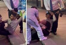 A Saudi man restrains a suspected phone thief on a London pavement as others gather around, in a viral street confrontation video.