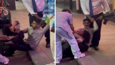 A Saudi man restrains a suspected phone thief on a London pavement as others gather around, in a viral street confrontation video.