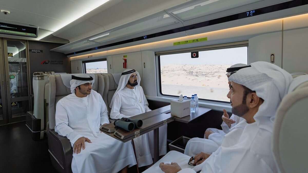 Sheikh Mohammed bin Rashid Al Maktoum reviews Etihad Rail progress during a test ride from Dubai to Fujairah with UAE officials.